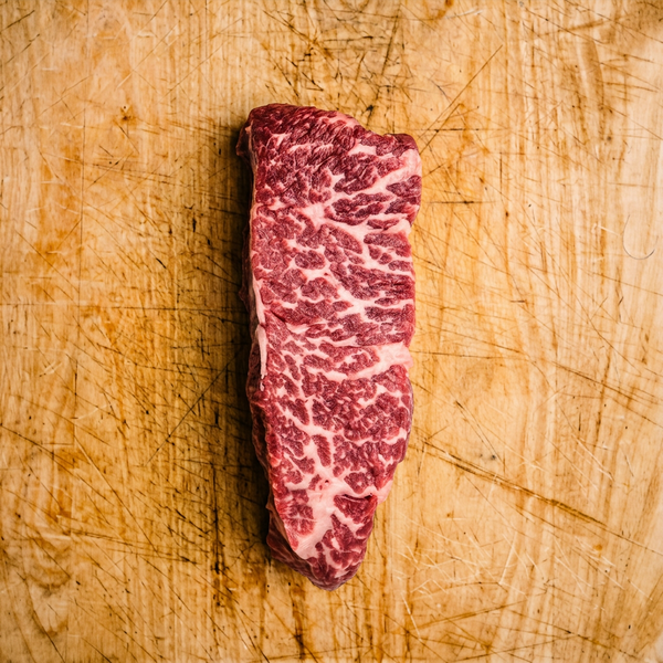 Denver steak on cutting board